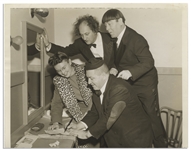 Moe Howard Personally Owned 10 x 8 Glossy Photo From 1939 of Curly, Moe & Larry Hamming It Up While Signing an Autograph -- Very Good Condition